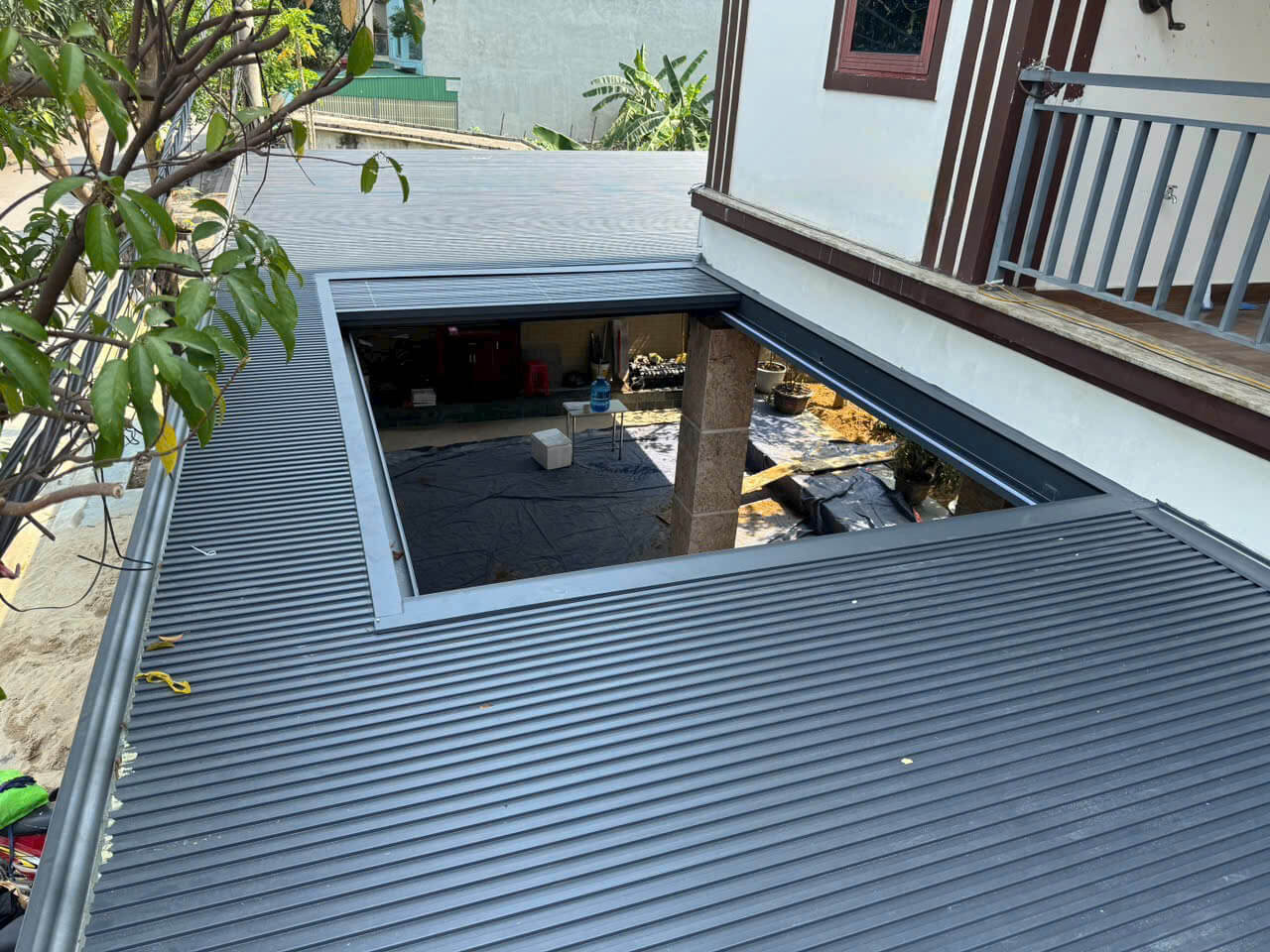 mái nhôm xếp trượt díc dắc