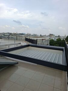 Mái nhôm xếp lùa tự động che ô lấy sáng sân thượng KDC Đạt Gia Hóc Môn